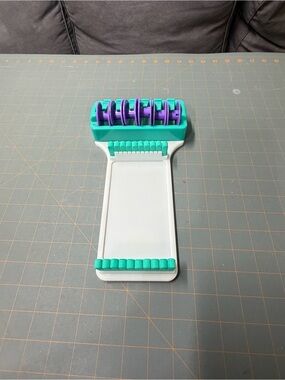 Craft Tool with Teal and Purple Accents